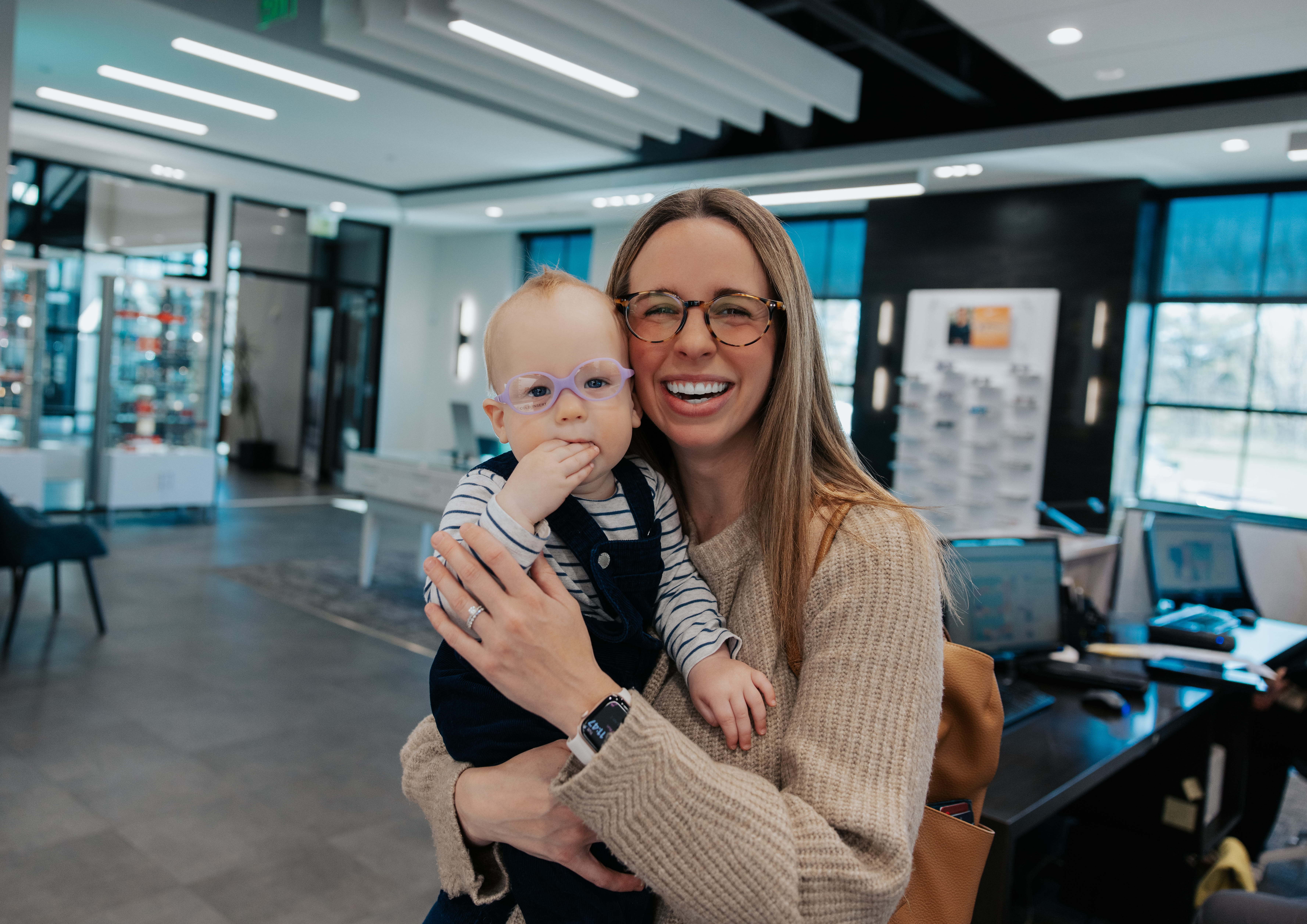 Patient with child in optometry office